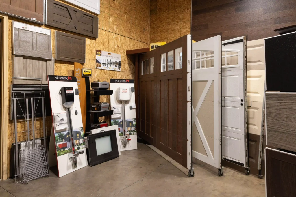 Garage door showroom in Centerville, Utah, displaying residential door styles at Colonial Building Supply.